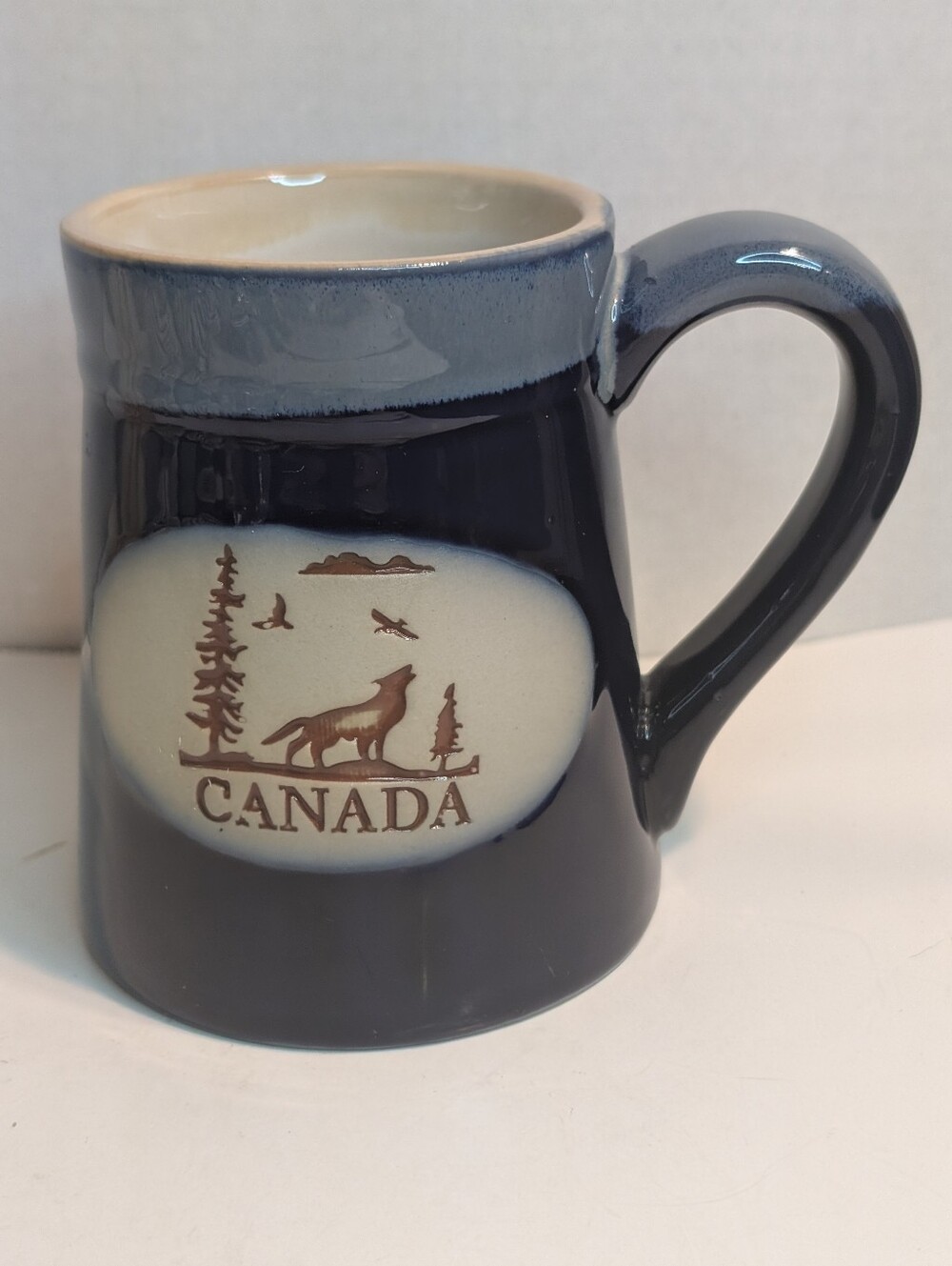 Coffee Mug Large CANADA  Embossed Wolf Howling Design.